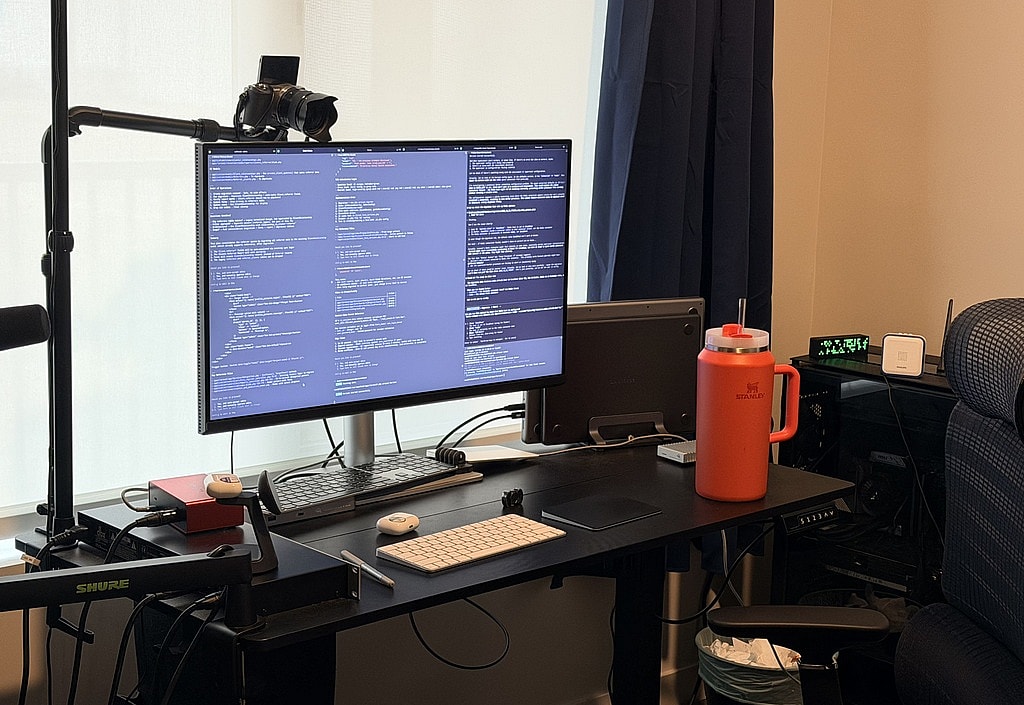 This is what 'working' looks like now: 20+ Claude Code instances across multiple projects, all running simultaneously. That picture has 6 proper iTerm tabs and the one being shown is split into 7 sub-tabs. Some planning, some working, all moving different tasks forward.